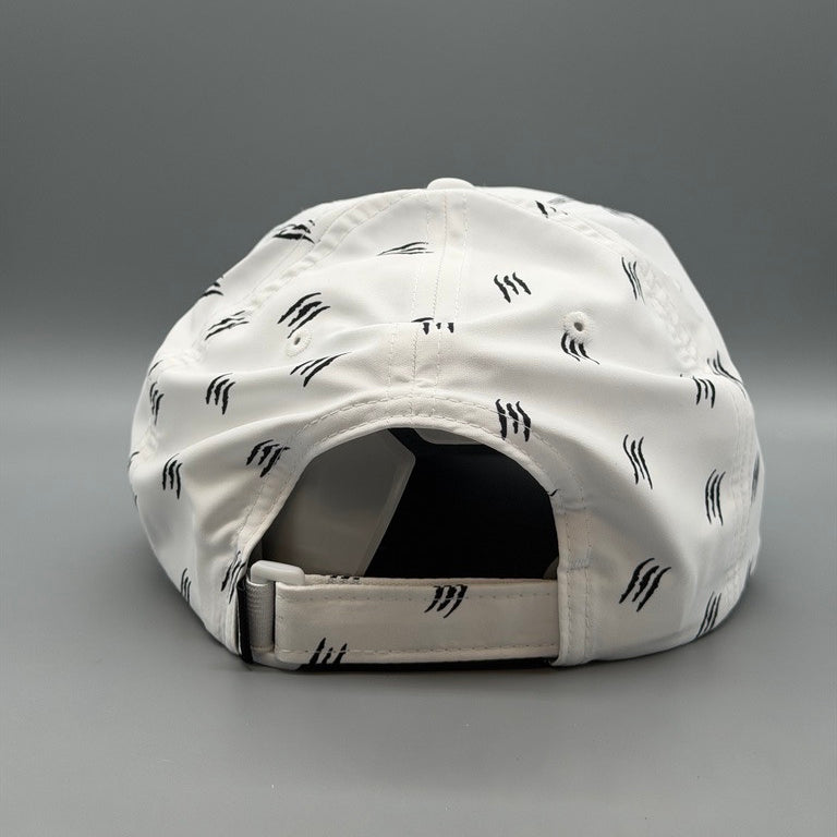 The Claw white and black hat showing adjustable rear strap