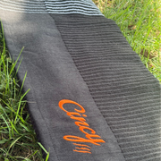 The Cincy Golf Towel - Winston Collection - Black, close-up of embroidered Cincy script