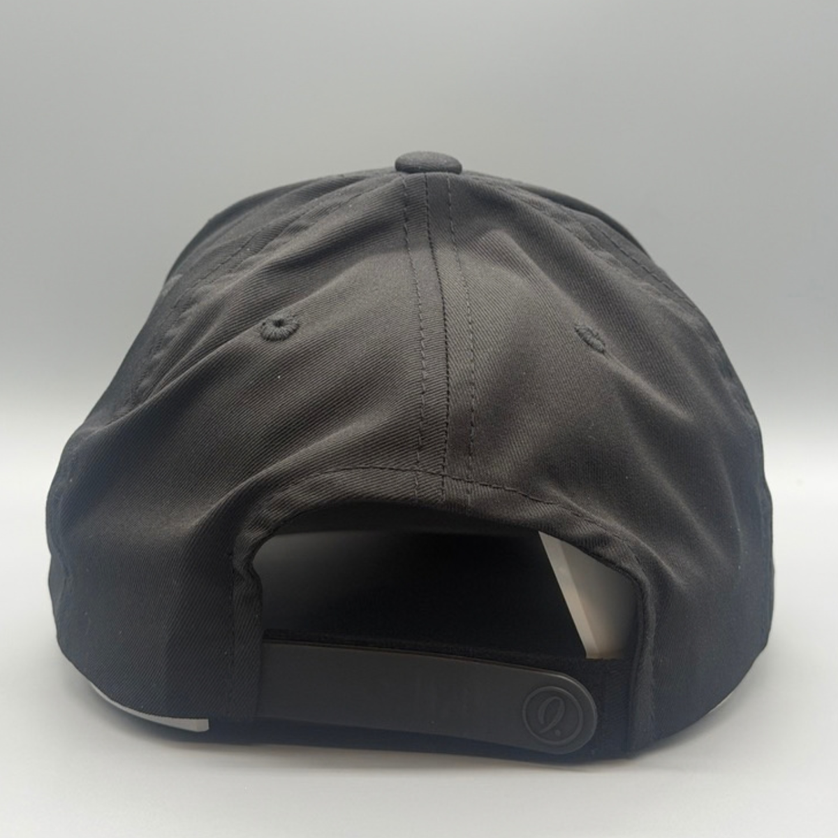 Front view of The Casual Mid-Crown black cap with puffed orange Cincy script logo