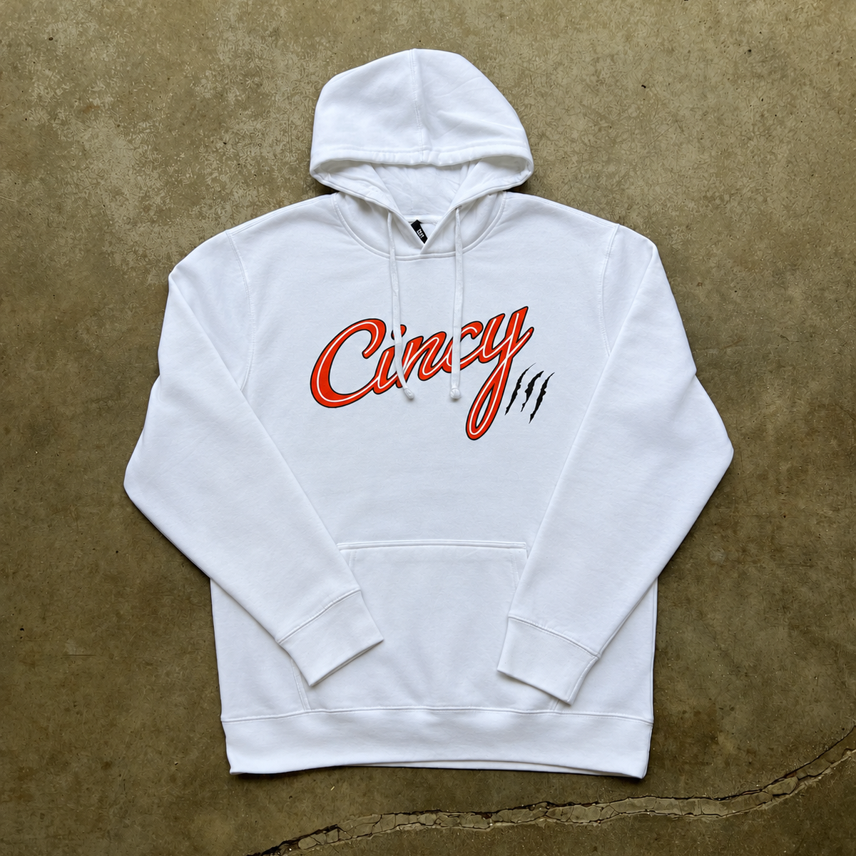 White Barbershop Cincy hoodie with large center-front logo and drawstrings hanging over the front